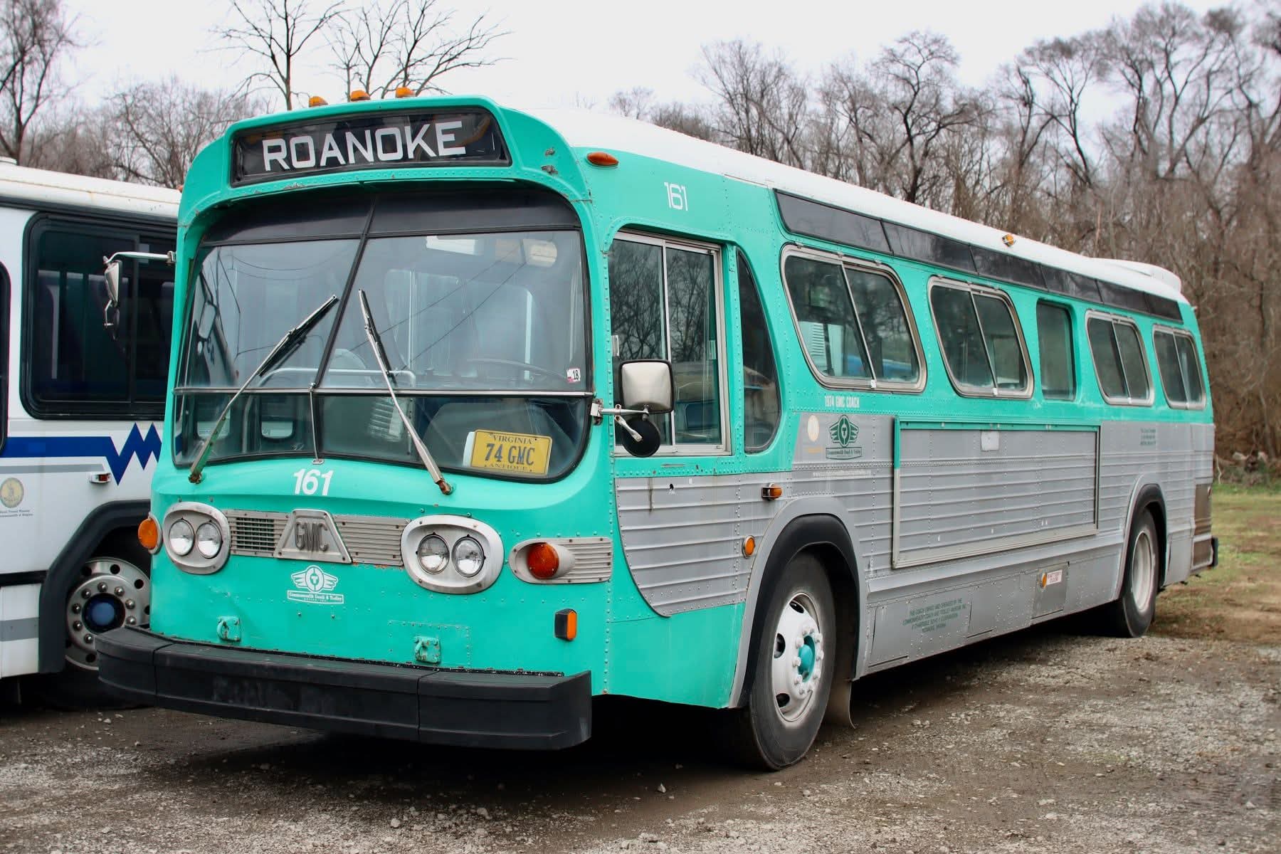 A GM New Look Fishbowl bus in a turquoise Altoona Amtran livery